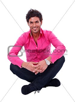 Trendy guy smiling to camera