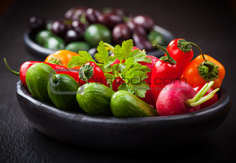 Raw snack vegetable with olives