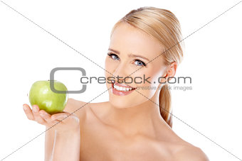 Happy and healthy woman holding apple