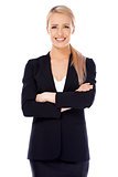 Smiling blond business woman on white