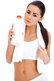 Woman is hoding bottle of milk