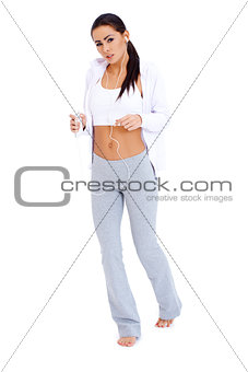 Full body of a female relaxing with music