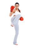 Full body shot of female kick boxer