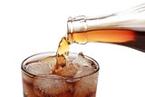Cola pouring into a glass