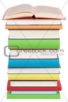 Opened book on a stack of books