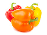 Three sweet red, orange, and yellow peppers