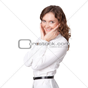 Portrait of pretty young businesswoman with hand on chin and smi