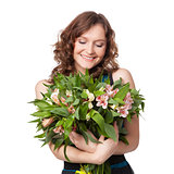 Portrait of pretty brunette holding bouquet of flowers