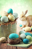 Easter scene with speckled eggs in bowl