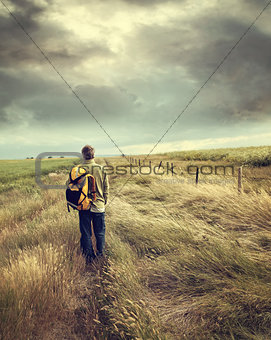 Man walking down country road