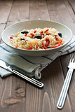 Rice with red capsicum and black olives