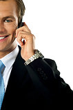 Cropped image of young businessman talking