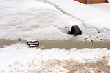 Car under snow in winter