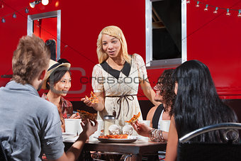 Diverse Friends Eating Together