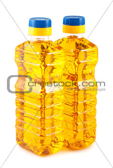 Two plastic bottles of sunflower oil