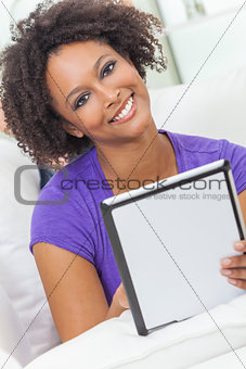 Mixed Race African American Girl Using Tablet Computer