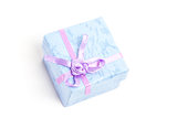 Overhead of blue gift box with purple ribbon