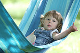 little girl on a hammock,