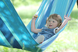 little girl on a hammock