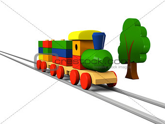 Wooden toy train on rails