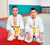 boys in sports hall is engaged in judo