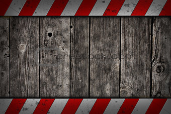 wooden background with warning bars
