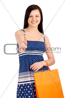 Beautiful woman holding shopping bag