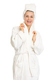 Portrait of smiling young woman in bathrobe
