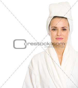 Portrait of young woman in bathrobe