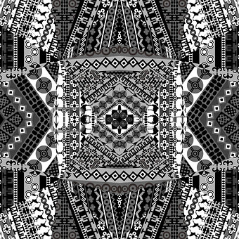 Background with mosaic of African black and white patterns