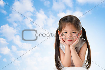 Young Asian girl with smile on her face 