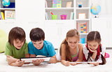 Kids using tablet computers