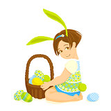 Little girl-bunny with a basket of eggs