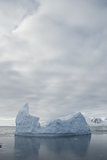 Icebergs against the overcast sky.