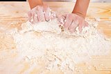 Hands with dough