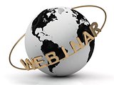 Gold Webinar and gold ring diagonally, abstraction of the inscription around the earth