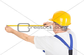 worker with measuring tape 