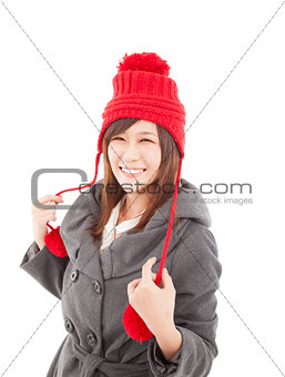 young asian woman wearing winter coat and cap