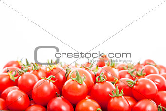 Group of fresh tomatoes on the white background