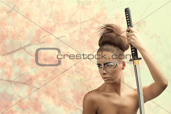 brunette in japan style with katana looks at right