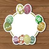 Easter eggs on wood background 