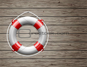 Life Buoy on  a Wooden Paneled Wall with Copy Space.