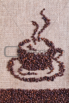 Coffee on burlap sack background