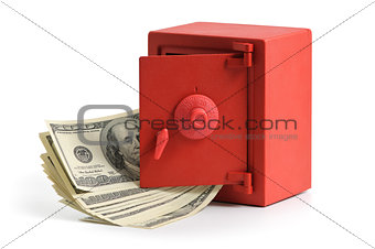 little red safe with dollar bills