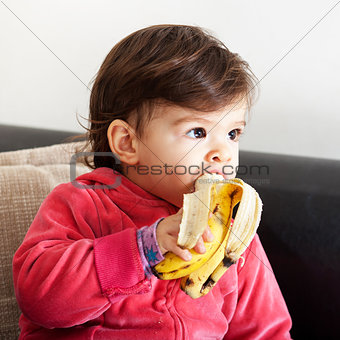 Baby eat banana