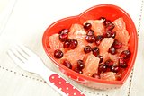 fruit salad in red heart