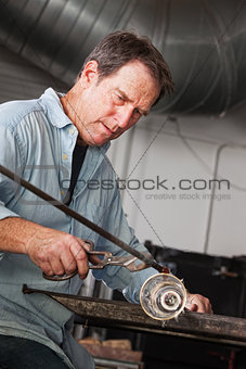 Artisan Concentrating on Work