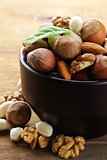 mix nuts - walnuts, hazelnuts, almonds on a wooden table