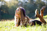 Beautiful Young Woman lying on grass