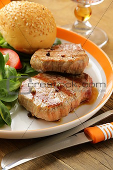 beef steak grilled with fresh salad garnish